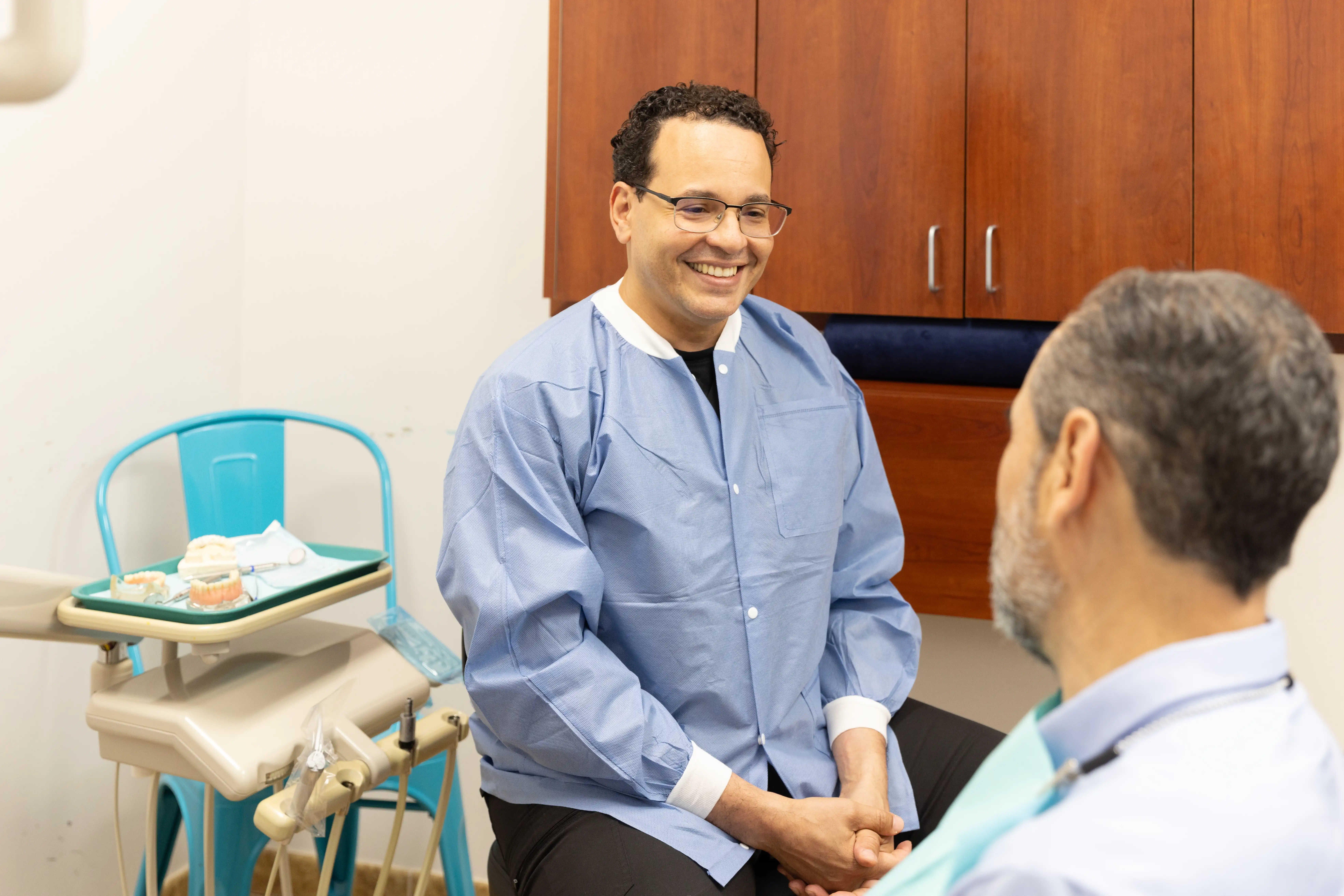 Dr. Rodriguez explaining dental sedation to a patient
